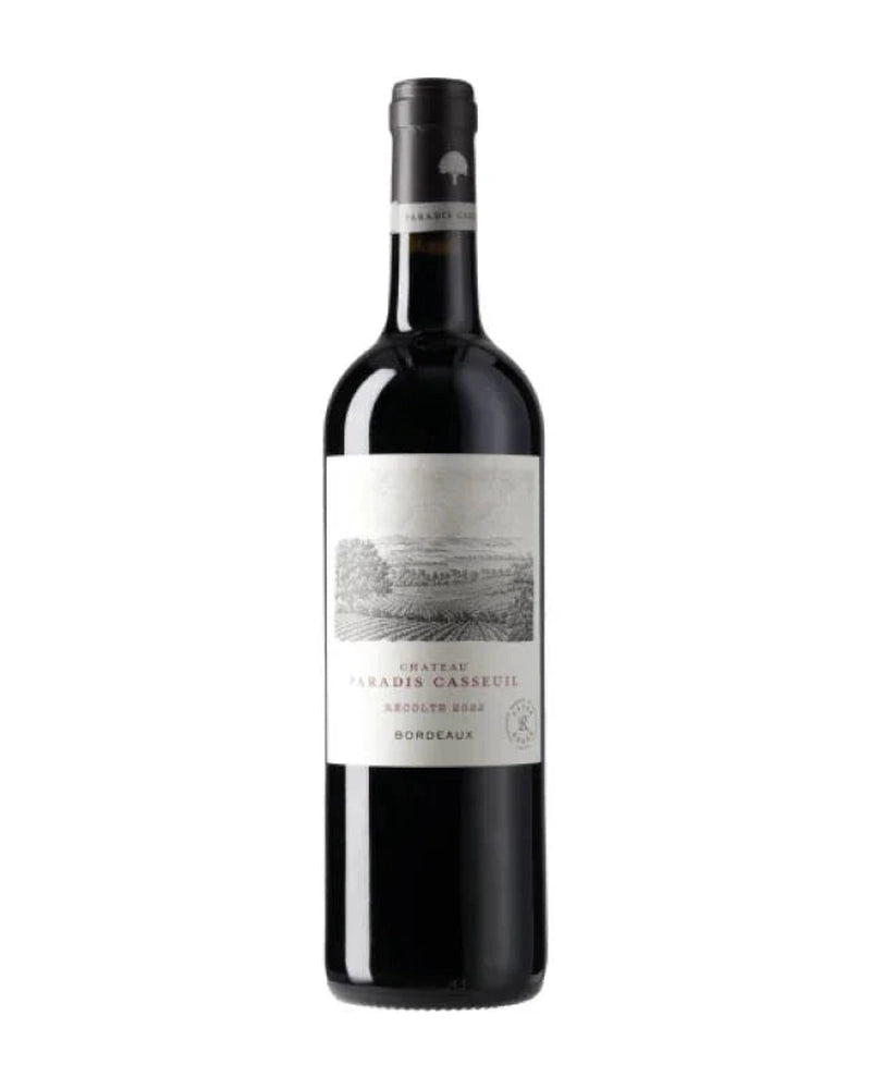 Bordeaux Rotwein Château Paradis Casseuil 2022 AOC von GrapeFactory GmbH in einer Weinflasche auf einem Weinglas.